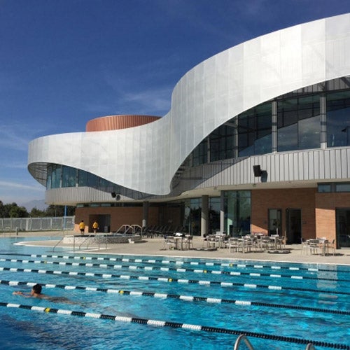 An outside view of UCR’s state-of-the-art Student Recreation Center (SRC) and its recreational/lap swimming pool.