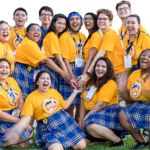 Fourteen UCR students gather together to show their R'school spirit and feature their Highlander blue and gold kilts.