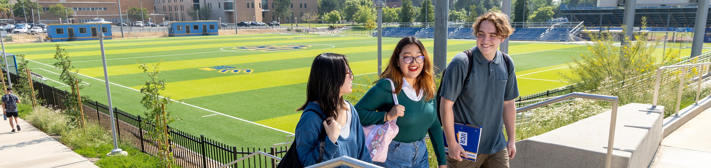 Students walking near the UCR soccer field