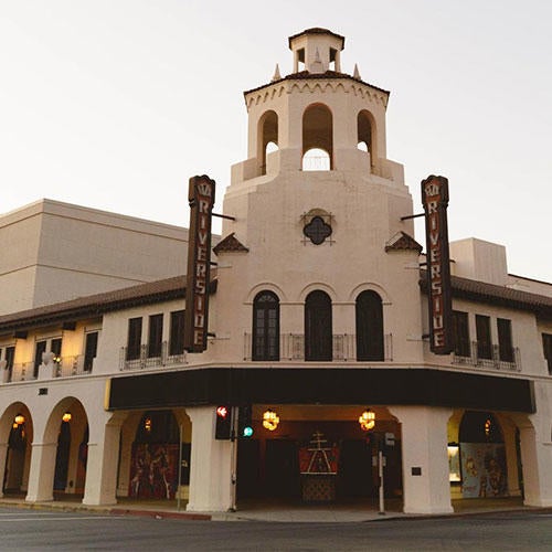 In front of the Fox Theater in Riverside at sunset.