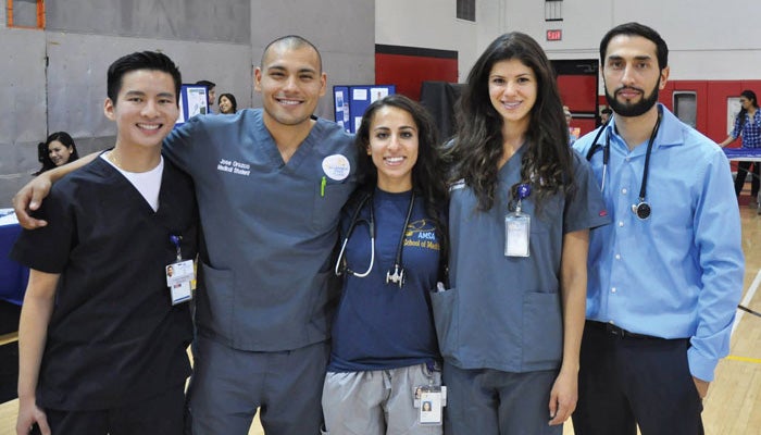 UCR_SOM_Students A group of five School of Medicine students smile for the camera