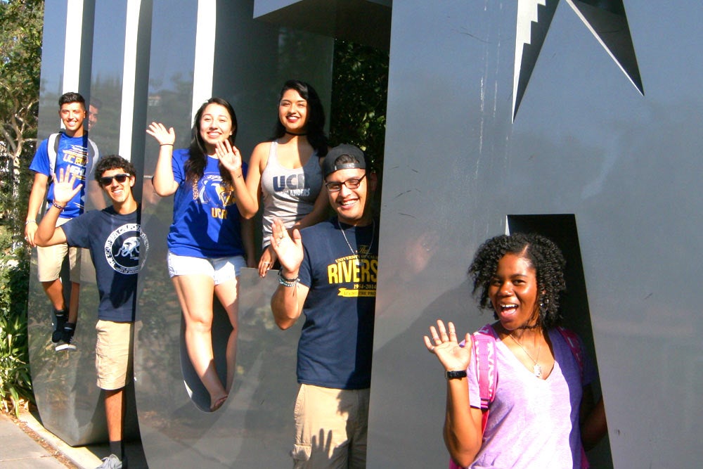 UCR Students Pose in the UCR Letters UCR students pose in the UCR Letters