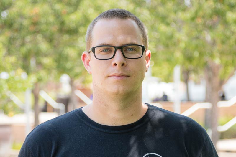 Student Profile - Edward Blodgett Marine Corps veteran, Edward Blodgett stands on the UCR campus
