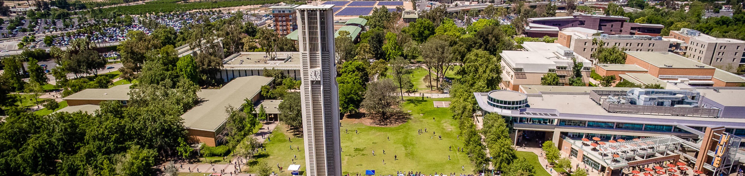 Aerial view of UCR campus that features the iconic 161-foot Bell Tower.